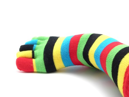 Right foot dressed with annulated stockingsの写真素材