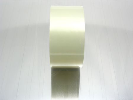 Standing sticky tape on gray reflecting mat の写真素材