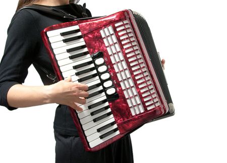 Cutout with a woman playing accordion on whiteの写真素材