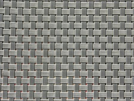 Gray background out of plait patternの写真素材