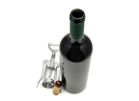 Red wine and corkscrewの写真素材