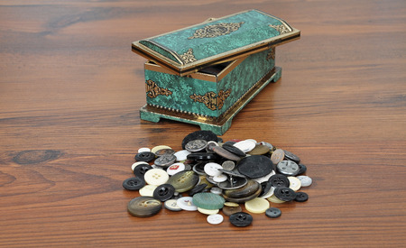 Casket with buttons