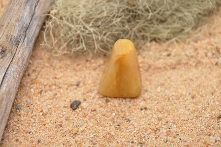 Orange calcite on beachの写真素材