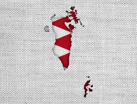 Map and flag of Bahrain on old linenの写真素材
