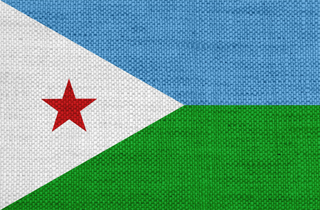 Flag of Djibouti on old linenの写真素材