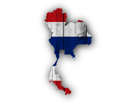 Map and flag of Thailand on weathered woodの写真素材