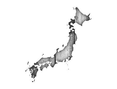 Map of Japan on weathered woodの写真素材