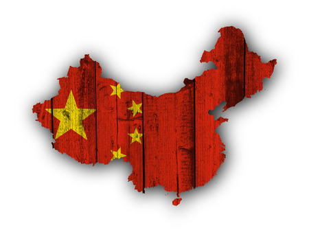 Map and flag of China on weathered woodの写真素材
