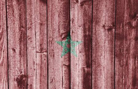 Flag of Morocco on weathered woodの写真素材