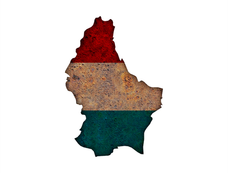 Map and flag of Luxembourg on rusty metalの写真素材