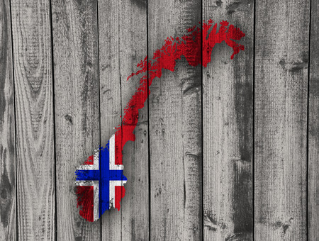 Map and flag of Norway on woodの写真素材