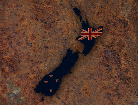 Map and flag of New Zealand on rusty metalの写真素材