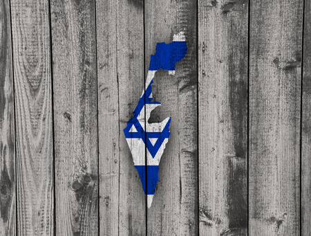 Map and flag of Israel on weathered woodの写真素材