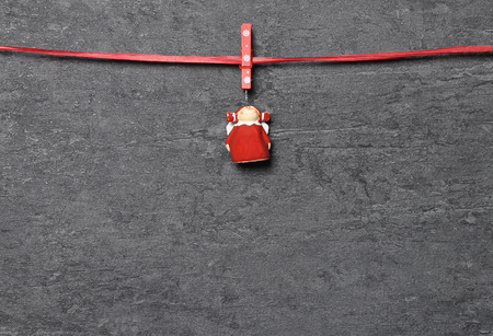 Shale board with Christmas angel as backgroundの写真素材