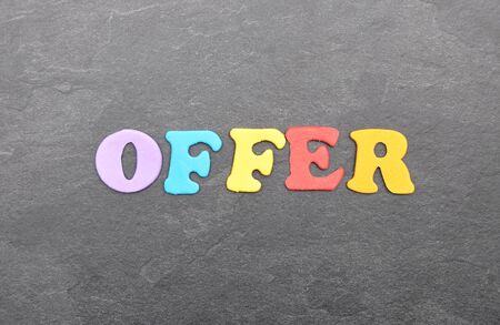 Term from colorful letters on slate board
