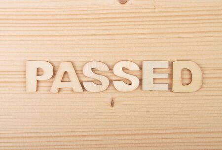 Term from wooden letters on pale woodの写真素材