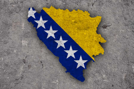 Map and flag of Bosnia and Herzegovina on weathered concreteの写真素材