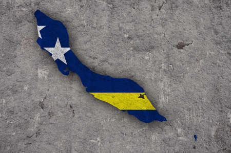 Map and flag of Curacao on weathered concreteの写真素材