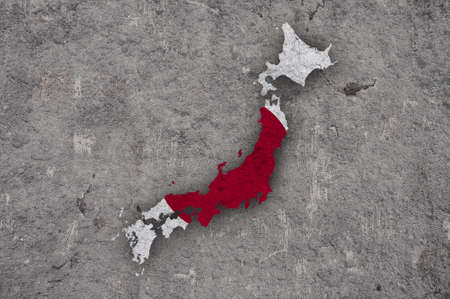 Map and flag of Japan on weathered concreteの写真素材
