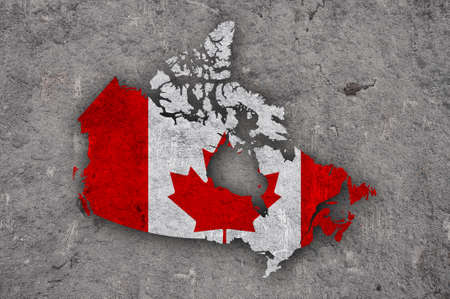 Map and flag of Canada on weathered concreteの写真素材