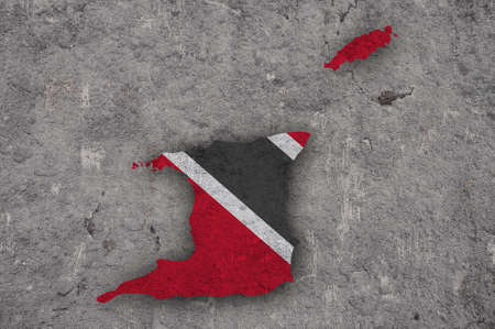 Map and flag of Trinidad and Tobago on weathered concreteの写真素材