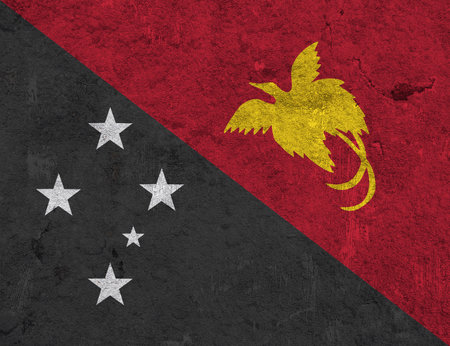 Flag of Papua New Guinea on weathered concreteの写真素材