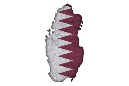 Map and flag of Qatar on weathered concreteの写真素材