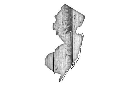 Map of New Jersey on weathered woodの写真素材