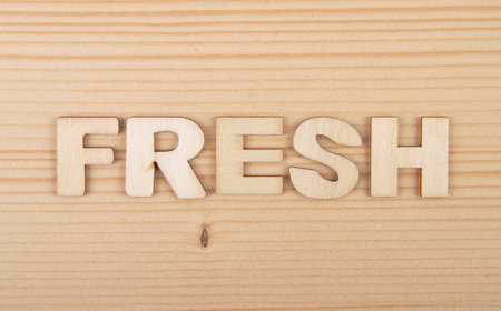 Term from wooden letters on pale woodの写真素材