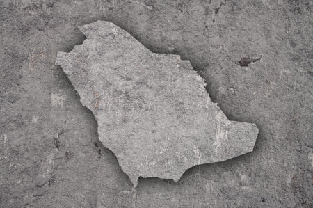 Map of Saudi Arabia on weathered concreteの写真素材