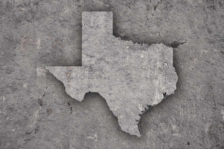 Map of Texas on weathered concreteの写真素材