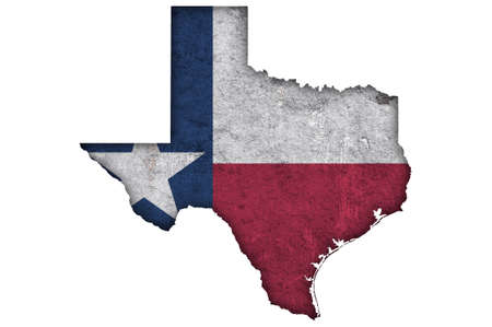 Map and flag of Texas on weathered concreteの写真素材
