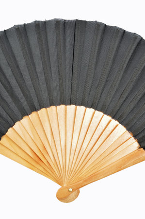 Detail of a hand held fan out of bamboo on a white backgroundの写真素材