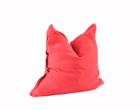 Small red pillow on a white backgroundの写真素材