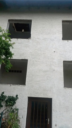 Colorful and crisp image of detail of old building Repair of an apartment in need of renovationの写真素材