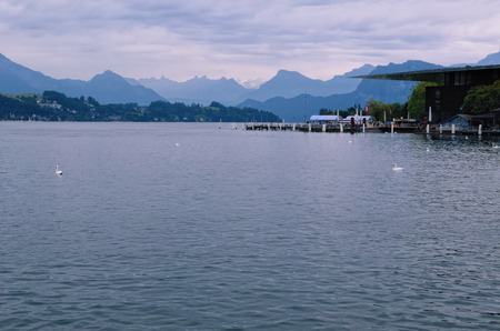 Lake Lucerne seen from the City of Lucerne, Switzerland, with the View of Distant Mountainsの写真素材