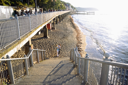 Svetlogorsk, Russia â August 24, 2016 â Promenade and Beach Lit by Sun Light at Summer Sunset in the Baltic Sea Resort of Svetlogorsk, Kaliningrad Region, Russiaのeditorial素材
