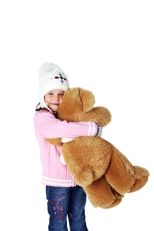 little child with a toy bearの写真素材