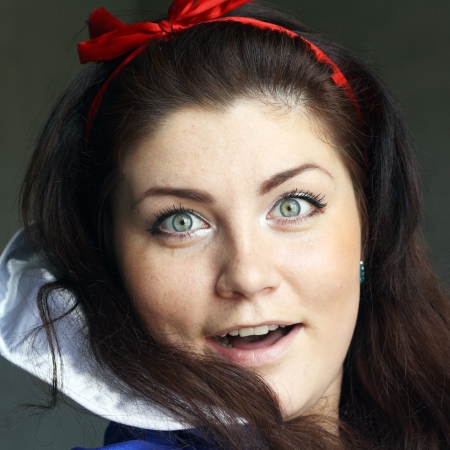 young beautiful surprised girl closeupの写真素材