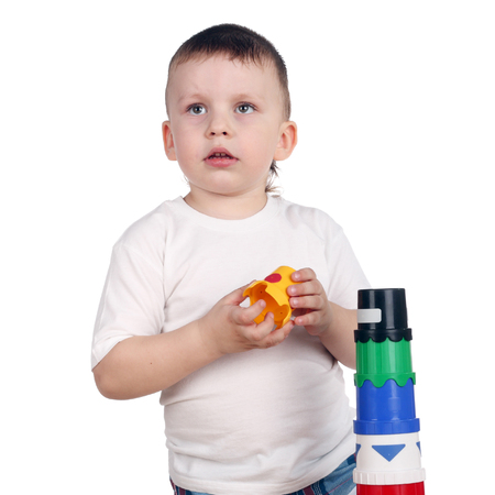little child building a toy towerの写真素材