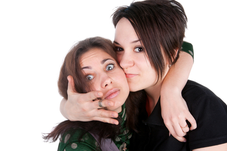 closeup image of the young pretty girls embracingの写真素材