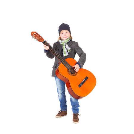 cute handsome little boy with the guitarの写真素材