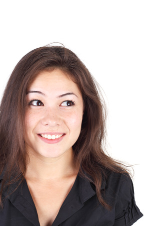 closeup image of the beautiful young brunette girl looking rightの写真素材