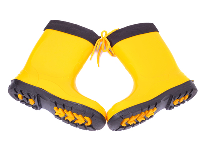 pair of the bright yellow rubber bootsの写真素材