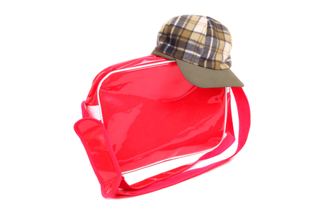 bright red bag and green capの写真素材