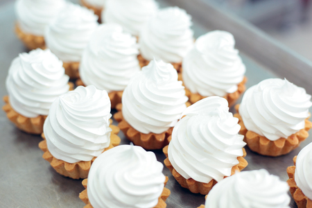 decorating dessert cream cakes closeupの写真素材