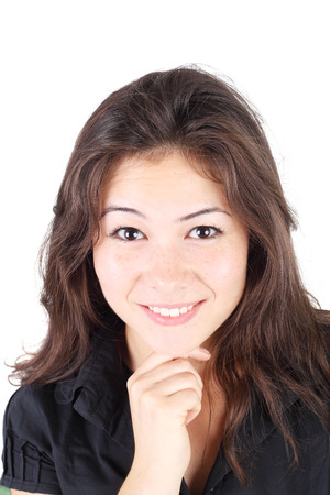 Closeup image of the beautiful young brunette emotional girlの写真素材