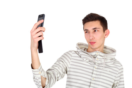 handsome young guy making selfieの写真素材