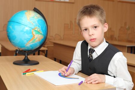 little boy in a classroomの写真素材