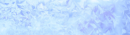 blue winter ice ornament on the glass